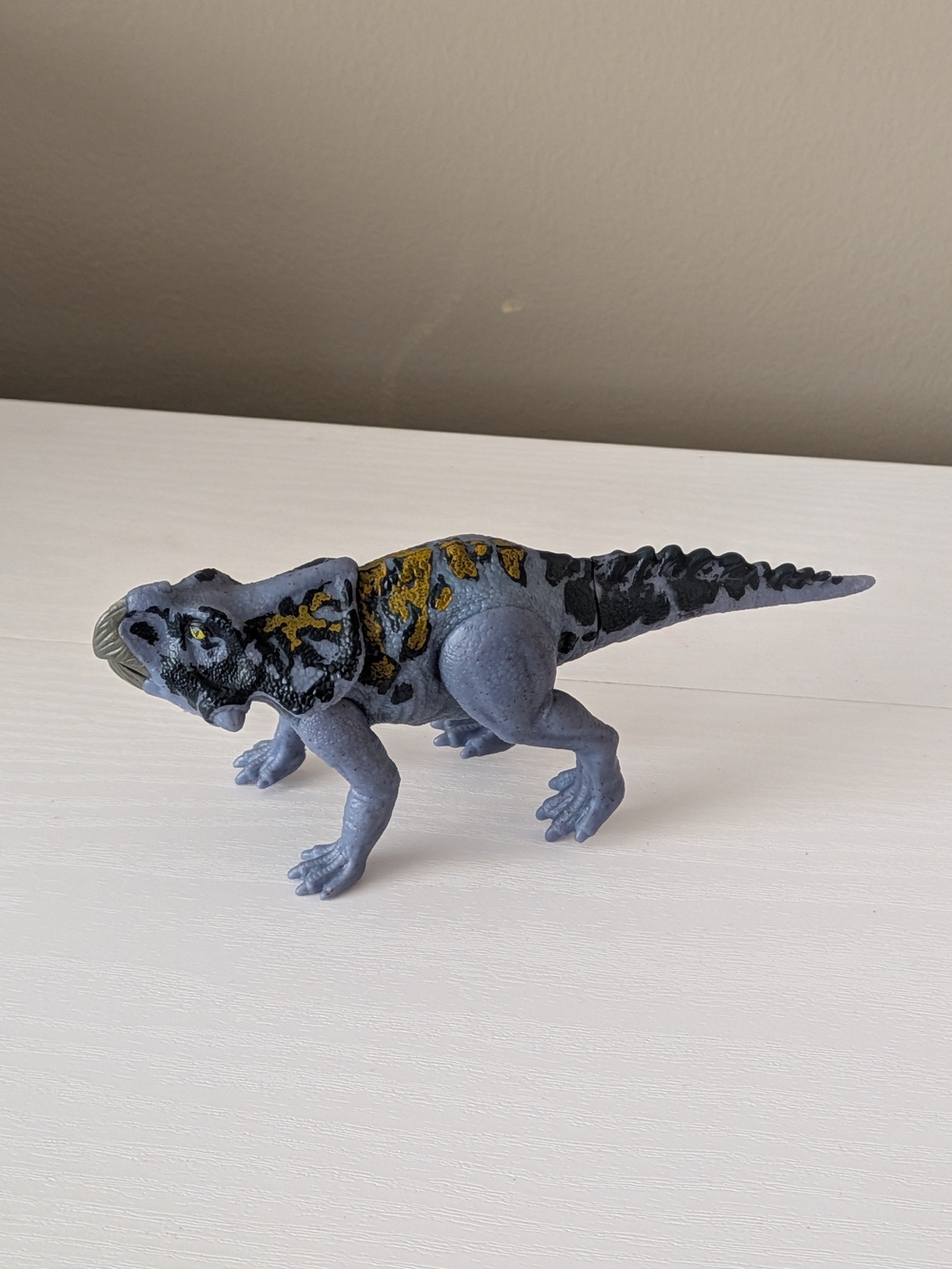 Gray and Black Reptile Habitat Ornament with Yellow Accents